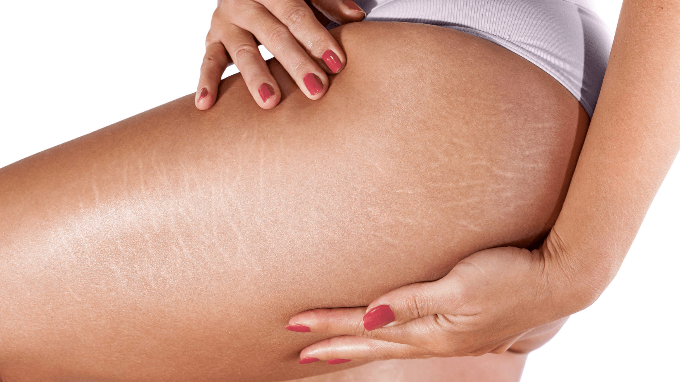 woman holding bottom of thigh